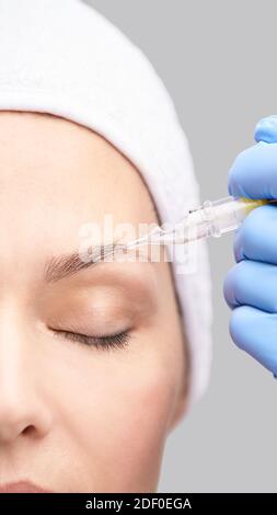 Beautician skin care. Face derma make up. Facial treatment. Woman dermatology Stock Photo
