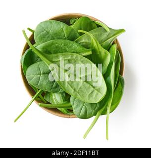 fresh green spinach leaves in cardboard container isolated on white background, top view Stock Photo