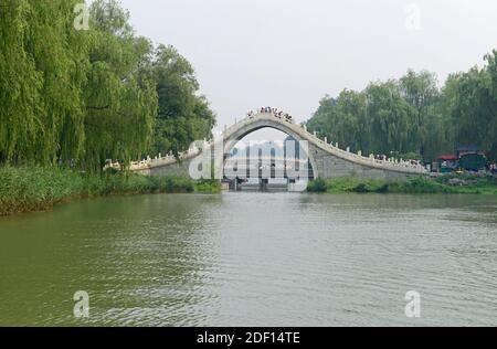 View of the humpback Jade Belt bridge, built in the mid 1700s in the Qianlong emperors reign, at the Summer Palace in northwestern Beijing Stock Photo