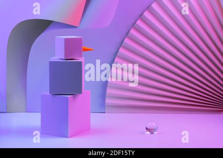 The polygonal snowman of cubes is illuminated with neon light, against the background of the fan and corners of the paper. Trend Concept 2020, 2021 Stock Photo