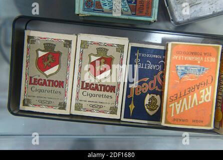 Old cigarette packets on sale in an antiques market in western Beijing, China Stock Photo