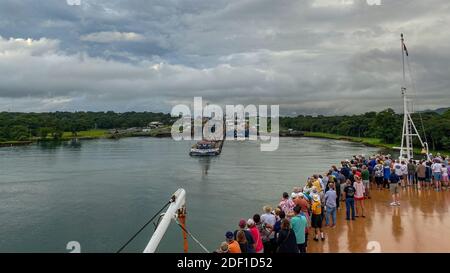 Panama - 11/6/19: A cruise ship with the passengers on the bow watching the ship enter the Panama Canal. Stock Photo