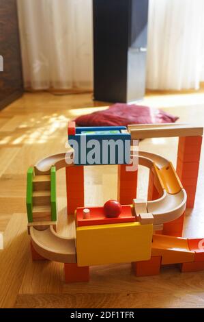 A vertical shot of a  multicolored toy for children in a room Stock Photo
