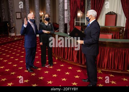 Washington, USA. 02nd Dec, 2020. Vice President Mike Pence conducts a mock swearing in ceremony of Senator elect Mark Kelly, D-AZ, accompanied by his wife, Gabrielle Giffords, in the Old Senate Chamber on Capitol Hill, in Washington, DC, Wednesday, December 2nd, 2020. ( Credit: Sipa USA/Alamy Live News Stock Photo