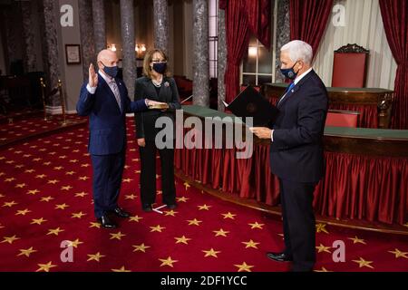 Washington, USA. 02nd Dec, 2020. Vice President Mike Pence conducts a mock swearing in ceremony of Senator elect Mark Kelly, D-AZ, accompanied by his wife, Gabrielle Giffords, in the Old Senate Chamber on Capitol Hill, in Washington, DC, Wednesday, December 2nd, 2020. ( Credit: Sipa USA/Alamy Live News Stock Photo