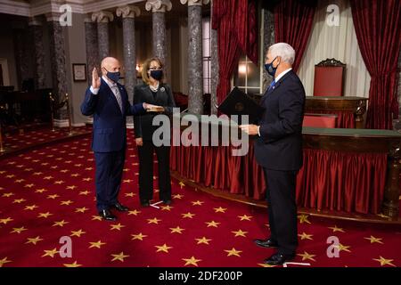 Washington, USA. 02nd Dec, 2020. Vice President Mike Pence conducts a mock swearing in ceremony of Senator elect Mark Kelly, D-AZ, accompanied by his wife, Gabrielle Giffords, in the Old Senate Chamber on Capitol Hill, in Washington, DC, Wednesday, December 2nd, 2020. ( Credit: Sipa USA/Alamy Live News Stock Photo