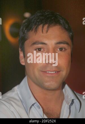 Miami Beach, FL 6-23-2003 Boxer Oscar De La Hoya joins wife, singer  Milly Corretjer at Touch Restaurant. The party was held to celebrate Millie gracing the cover of the July issue of Selecta Magazine. Photo by ©Adam Scull/PHOTOlink Stock Photo