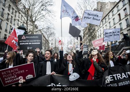 Protesters hold banners and chant slogans during a demonstration called by the 'SOS Retraites' collective, gathering lawyers, doctors, nurses, pilots and other independent workers, to protest the French government's reform of the pension system, on February 3, 2020, in Paris, France. Photo by Magali Cohen/ABACAPRESS.COM Stock Photo