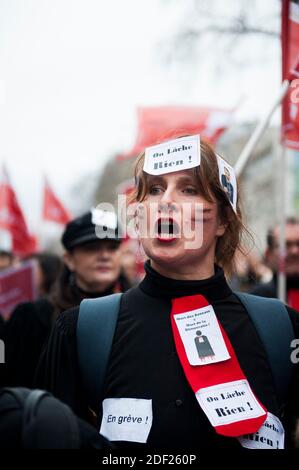 Protesters hold banners and chant slogans during a demonstration called by the 'SOS Retraites' collective, gathering lawyers, doctors, nurses, pilots and other independent workers, to protest the French government's reform of the pension system, on February 3, 2020, in Paris, France. Photo by Magali Cohen/ABACAPRESS.COM Stock Photo