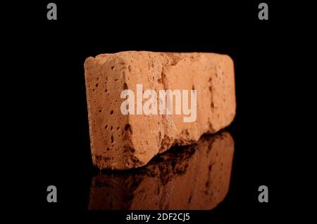 Clinker brick for house facade decor isolated on the black background Stock Photo