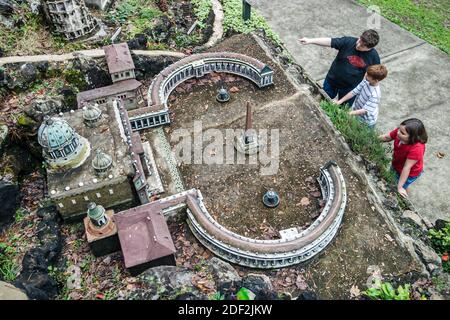 Alabama Cullman Ave Maria Grotto,miniature replicas biblical structures world famous buildings,St. Peter's Basilica boys girl looks looking, Stock Photo