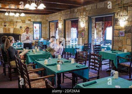 Alabama Lookout Mountain Fort Payne DeSoto State Park,Lodge Mountain Inn Restaurant inside interior guests,waitress writing taking orders breakfast Stock Photo