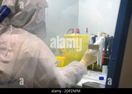 Scientists at work in high-level P3 biosafety security laboratory at the Pasteur Institute of Lille, on February 20, 2020 in Lille, France. The research institute has sequenced the genome of Coronavirus 2019-nCoV using blood samples taken from the first confirmed French cases of the virus. The institute's scientists will now focus on developing how the virus works, treatments and a possible vaccine. Photo by ABACAPRESS.COM Stock Photo