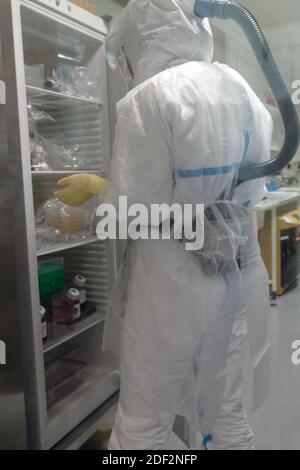 Scientists at work in high-level P3 biosafety security laboratory at the Pasteur Institute of Lille, on February 20, 2020 in Lille, France. The research institute has sequenced the genome of Coronavirus 2019-nCoV using blood samples taken from the first confirmed French cases of the virus. The institute's scientists will now focus on developing how the virus works, treatments and a possible vaccine. Photo by ABACAPRESS.COM Stock Photo