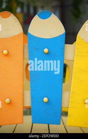 Large wooden pieces in the shape of pencils with different colors Stock Photo