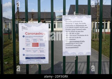 Closing of the Groupe Scolaire des Bruyeres - Jacques Bontempsin the Oise departement, north of Paris, France on March 2020. High-profile events have been cancelled, some schools have closed, and all school trips abroad have been suspended in France in a bid to stop the spread of the coronavirus Covid-19 epidemic. Meetings in the Oise department - one of the major epicentres of the virus in France - have been banned, as have any “gatherings of more than 5,000 people in a confined space”. Photo by Edouard Bernaux/ABACAPRESS.COM Stock Photo