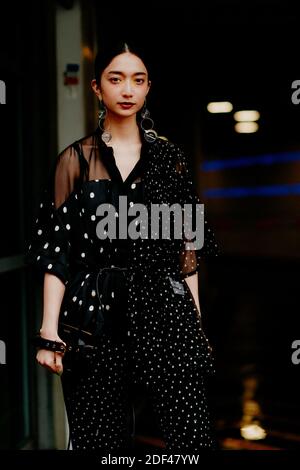 Street style, arriving at Sacai Fall Winter 2020-2021 show, held at Gare Montparnasse parking, Paris, France, on March 2nd, 2020. Photo by Marie-Paola Bertrand-Hillion/ABACAPRESS.COM Stock Photo