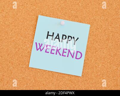 Writing note showing Happy Weekend. Business photo showcasing wishing someone to have a blissful weekend or holiday Happy weekend note over a kork boa Stock Photo
