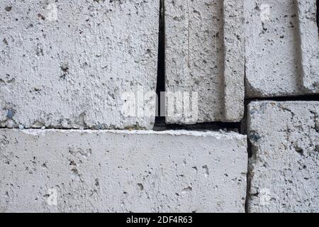 White concrete bricks closeup photo texture. Concrete block surface. Rough grey stone brick. Masonry wall made of big block. Rustic stone texture. Ind Stock Photo
