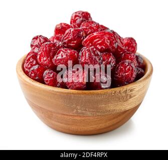 dried cranberries in wooden bowl isolated on white background Stock Photo
