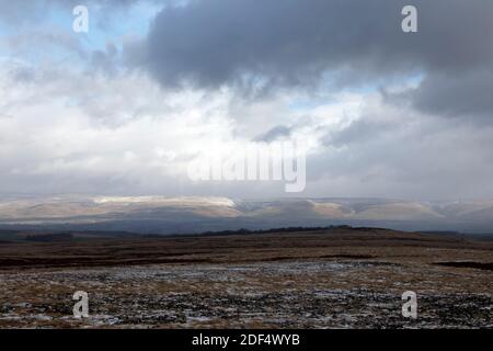 Long distance view of the Pennine escarpment (including High Cup)  from Orton Scar, Cumbria, England, UK Stock Photo