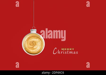 Christmas coffee cup bauble on red background. Stock Photo