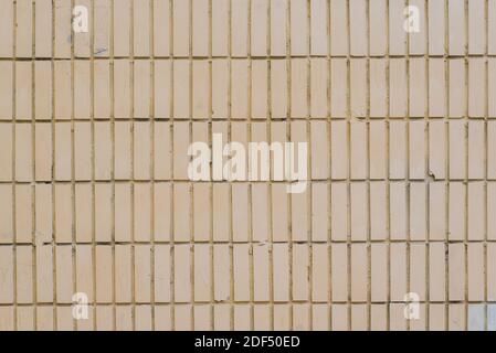 The texture of the walls of smooth brick or smooth tile white and yellow Stock Photo