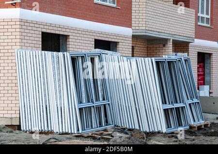 pvc window profile stack of plastic window frames Stock Photo