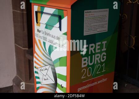 Freiburg Im Breisgau, Germany. 03rd Dec, 2020. A mailbox into which Freiburg citizens can drop letters to the city of Freiburg in 2120 is located in front of the city hall. The citizens are called upon to write a letter that will not be delivered for another 100 years. It is about a collective legacy for posterity, texts and thoughts from the 1920s of the 21st century. Credit: Philipp von Ditfurth/dpa/Alamy Live News Stock Photo