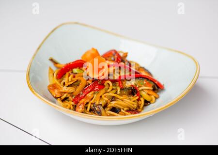 Spaghetti with chicken and veggies. Stock Photo