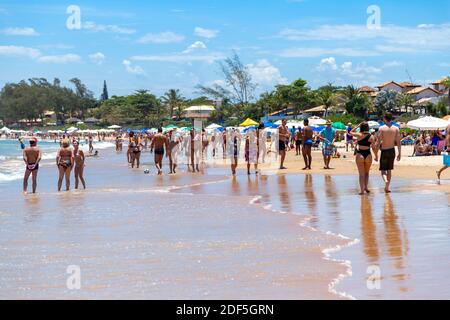 Buzios, Rio de Janeiro, Brazil – December 22, 2019: Praia da Geriba, Panoramic view of this beautiful beach. The people walking on the beach. Stock Photo