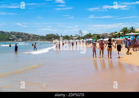 Buzios, Rio de Janeiro, Brazil – December 22, 2019: Praia da Geriba, Panoramic view of this beautiful beach. The people walking on the beach. Stock Photo