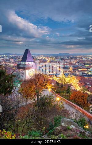 Graz, Austria. Cityscape image of the Graz, Austria with the Clock Tower at beautiful autumn sunset. Stock Photo