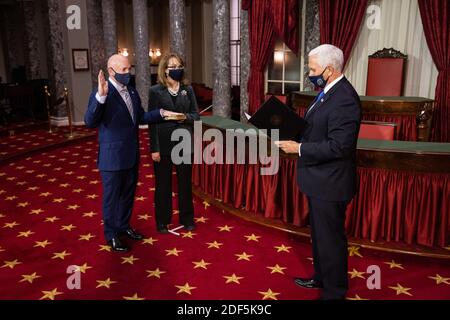 Vice President Mike Pence conducts a mock swearing in ceremony of Senator elect Mark Kelly, D-AZ, accompanied by his wife, Gabrielle Giffords, in the Old Senate Chamber on Capitol Hill, in Washington, DC, Wednesday, December 2nd, 2020.Credit: Graeme Jennings/Pool via CNP /MediaPunch Stock Photo