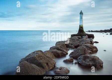 Long time exposure of Lighthouse in Low Tide in Shaldon in Devon in England, UK, Europe Stock Photo