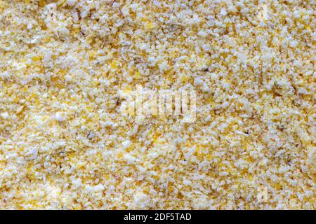 Macro view of ground cornmeal with varied texture and color Stock Photo