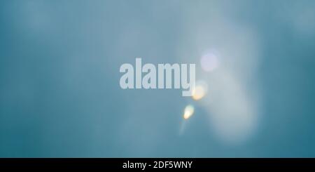 Abstract blue background with lens flare Stock Photo
