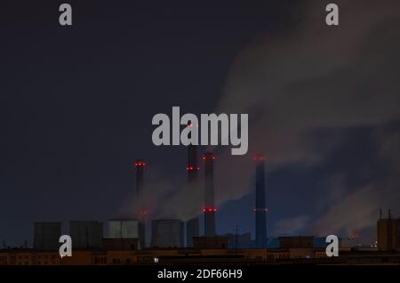 BUCHAREST, ROMANIA - 03 December 2020 - Night view of a coal-fired power station in Bucharest, Romania - Photo: Geopixnight
