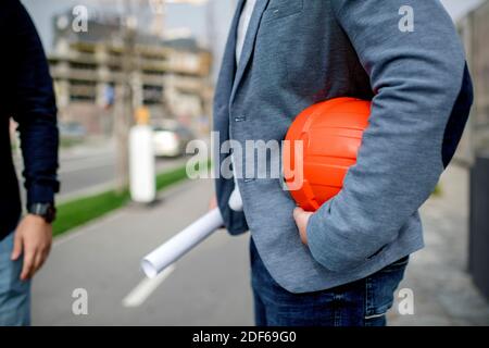 Two architects having work meeting at construction site Stock Photo