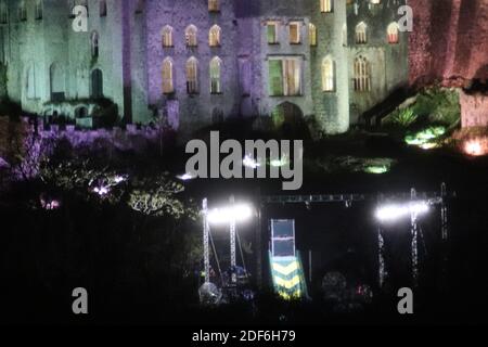 I'm a celebrity get me out of here Gwrych castle in Abergele North Wales is all  lit up at night in multi colours Credit : Mike Clarke / Alamy Live News Stock Photo