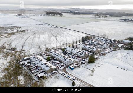 Tarbrax, South Lanarkshire, Scotland. 3rd Dec 2020. Weather: Aerial view of Tarbrax village, South Lanarkshire under a blanket on snow. Scotland, UK. 3rd December, 2020.    Credit: Ian Rutherford/Alamy Live News. Stock Photo