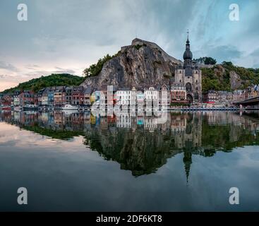 Scenic view of the town Dinant reflected in the river Meuse Stock Photo