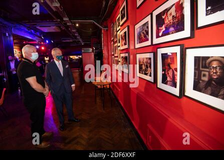 The Prince of Wales meeting Jeff Horton during a visit to the 100 Club nightclub in London. Stock Photo