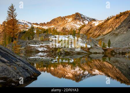 WA18640-00...WASHINGTON - The Entiat Mountains reflecting in Lower Ice Lake in the Glacier Peak Wilderness area of the Wenatchee National Forest.