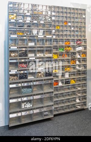 Platic Shelf Rack for Small Parts at Wall Storage Stock Photo - Alamy