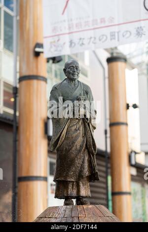 Statue of Gyoki (668–749),  Japanese Buddhist priest of the Nara period, in front of Kintetsu Nara Station, Nara City, Nara Prefecture, Japan Stock Photo