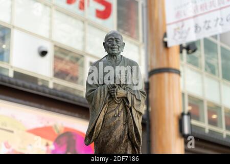 Statue of Gyoki (668–749),  Japanese Buddhist priest of the Nara period, in front of Kintetsu Nara Station, Nara City, Nara Prefecture, Japan Stock Photo