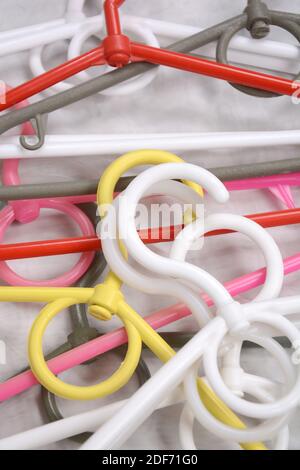 Many clothes hanger. Trempel on a white background. Store concept for sale, design. Empty hanger set. Stock Photo