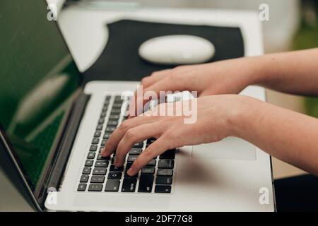 Close-Up Shot of Human Hands Placed Over Laptop Stock Photo