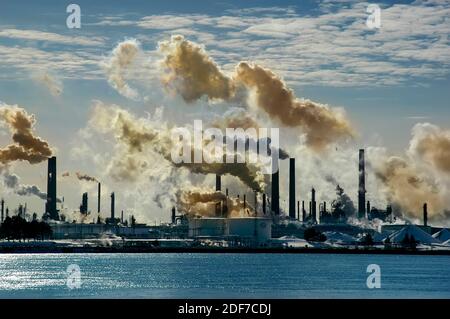 air pollution  frrom chemical valley in Sarnia Ontario Canada bordering Port Huron Michigan USA from oil refineries Stock Photo
